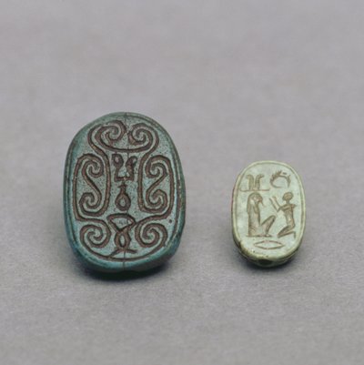 Egyptian faience scarab amulet, Second Intermediate Period; green feldspar scarab amulet, Late Period by Egyptian